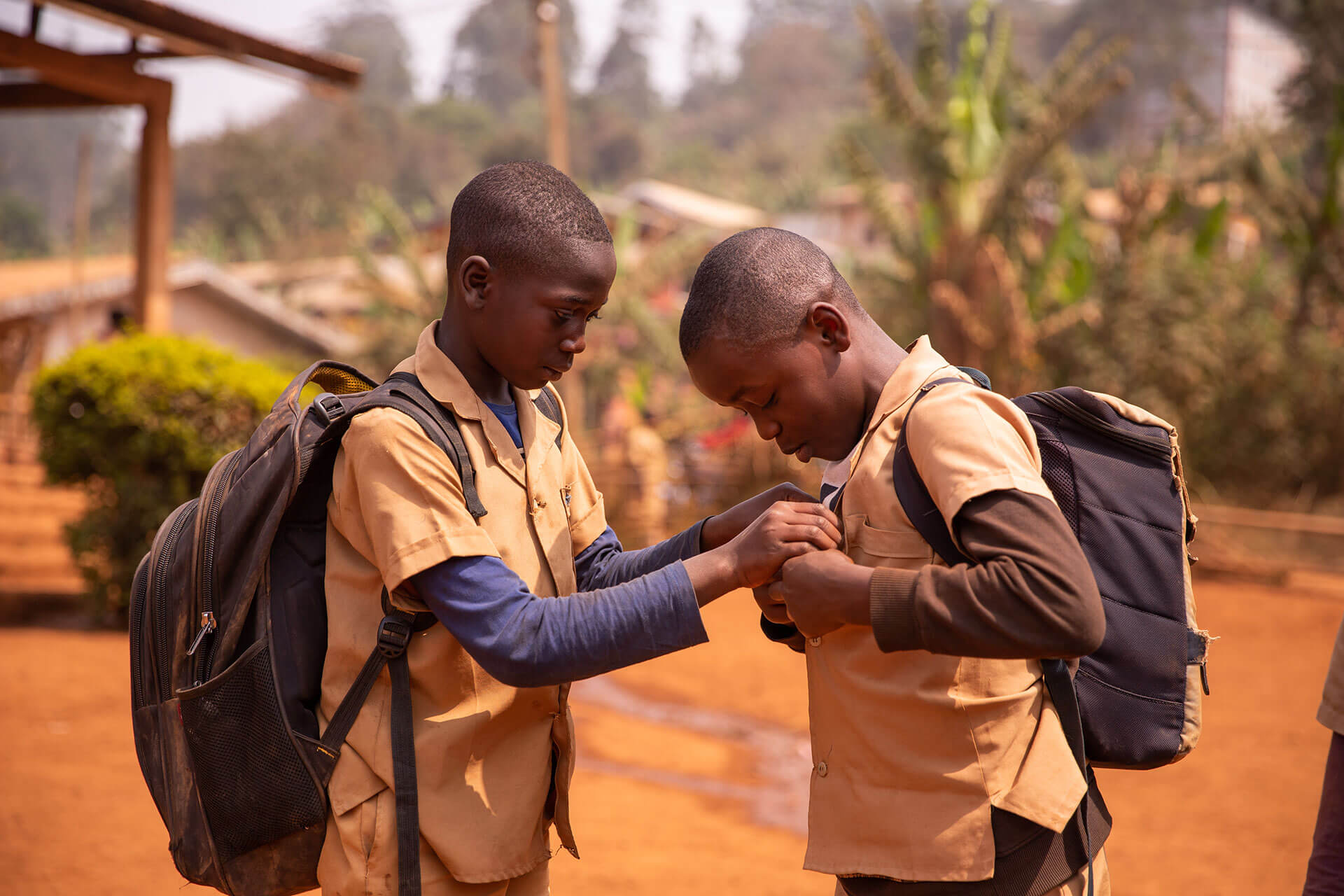 two-african-children-with-their-heavy-backpacks-1.jpg